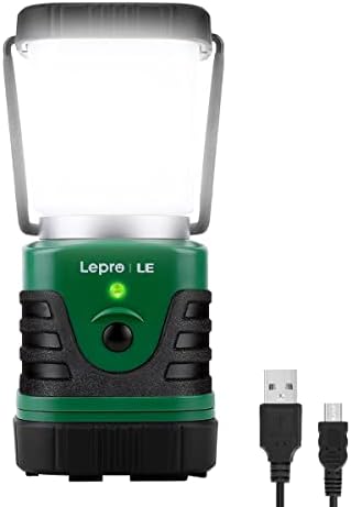 A green and black lamp with a usb cable