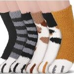 A set of six pairs of socks with cats feet on them.