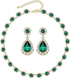 A necklace and earrings set with green stones.